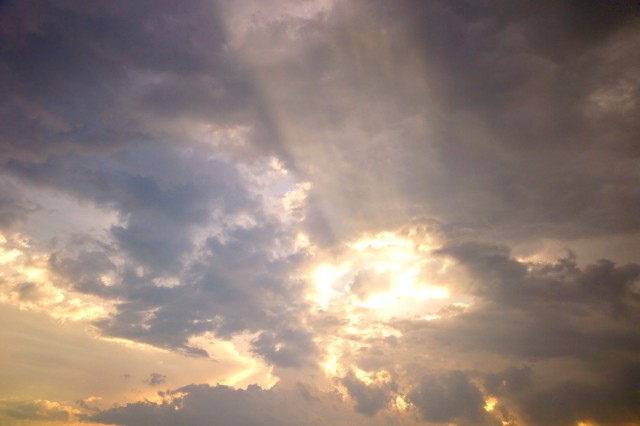 Sunbeams Piercing Storm Clouds